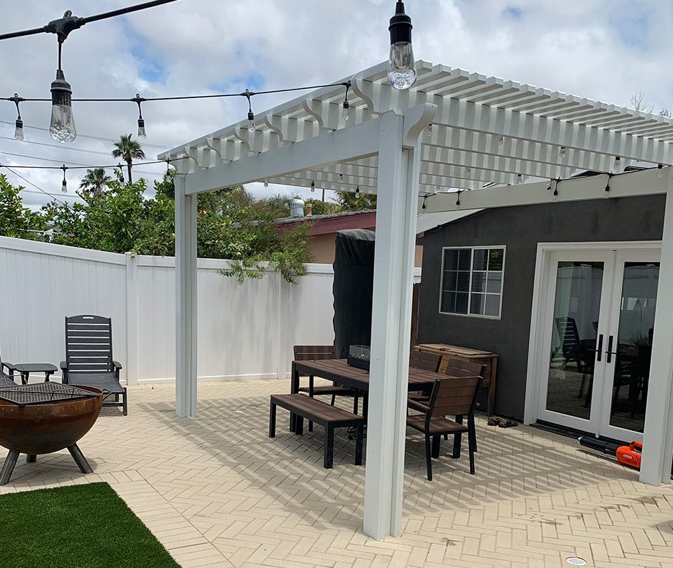 Custom white patio cover with market lights