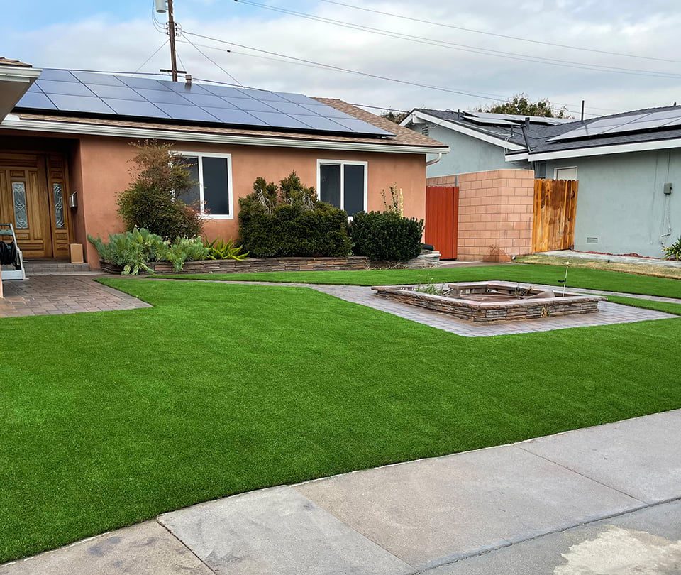 Front yard with solar and artificial turf
