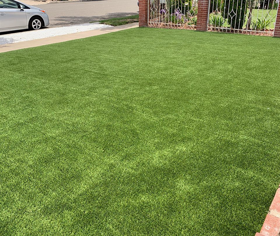 Front yard with synthetic turf