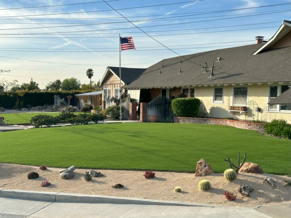 A house in Orange with artificial turf in the front yard.